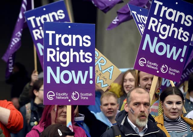 Trans rights demonstrators outside the Scottish Parliament as MSPs debated the census question on sex.