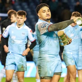 Glasgow Warriors' Sione Tuipulotu with the 1872 cup at full time.