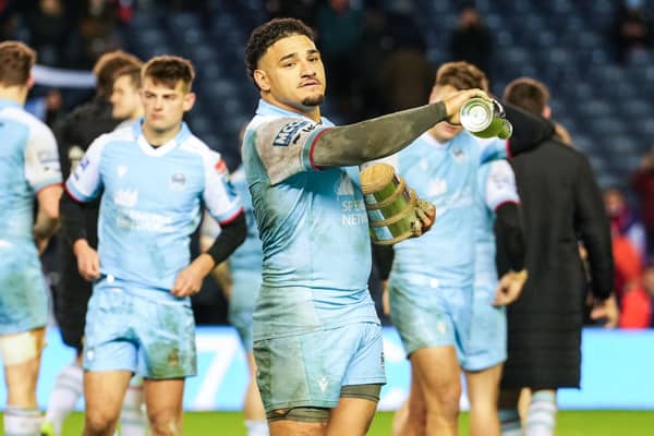 Glasgow Warriors' Sione Tuipulotu with the 1872 cup at full time.