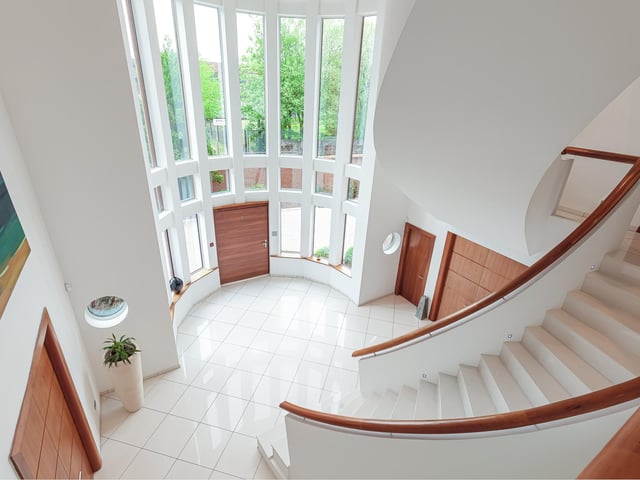 The entrance hall sets the scene for this grand contemporary home.