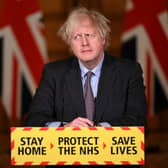 February 2021: Then prime minister Boris Johnson attends a virtual press conference inside 10 Downing Street after setting out the Government's roadmap out of the third Covid-19 lockdown (Picture: Leon Neal/Pool/AFP)