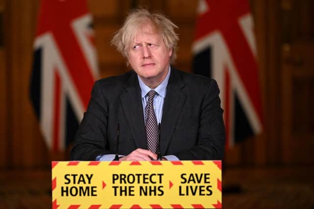February 2021: Then prime minister Boris Johnson attends a virtual press conference inside 10 Downing Street after setting out the Government's roadmap out of the third Covid-19 lockdown (Picture: Leon Neal/Pool/AFP)