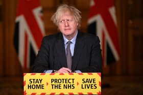 February 2021: Then prime minister Boris Johnson attends a virtual press conference inside 10 Downing Street after setting out the Government's roadmap out of the third Covid-19 lockdown (Picture: Leon Neal/Pool/AFP)