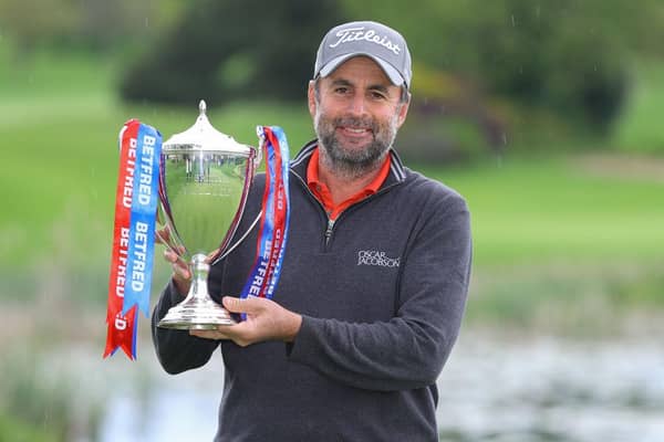 Richard Bland poses with the trophy after winning the Betfred British Masters hosted by Danny Willett at The Belfry. Picture: Richard Heathcote/Getty Images.