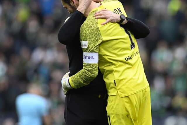 Hearts manager Robbie Neilson embraces Gordon at full time.
