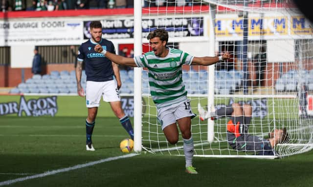 Jota celebrates making it 3-1 during the cinch Premiership match between Dundee and Celtic
