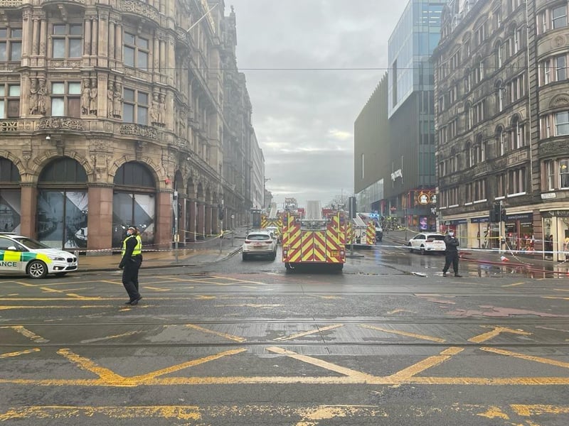 Marks and Spencer and the Mercure Hotel, in Princes Street, have been closed as firefighters work in the neighbouring former department store, and some buildings have been evacuated.