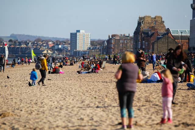 People flocked to Edinburgh's Portobello Beach to enjoy the sun