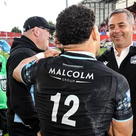 Glasgow Warriors' Sione Tuipulotu (no 12) celebrates with head coach Franco Smith after the semi-final win over Munster, with defence coach Pete Murchie on the right.  (Photo by Ben Brady/INPHO/Shutterstock)