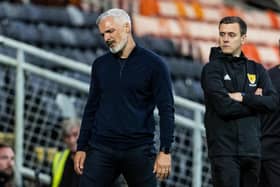 Dundee United manager Jim Goodwin looks dejected during the defeat by Partick Thistle.
