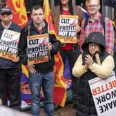 People take part in a trade union pay protest on Buchanan Street, Glasgow, as bin workers walk out in several council areas (Picture: Jane Barlow/PA Wire)