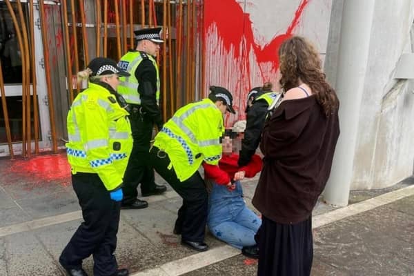 Protestors paint the Scottish Parliament (Image: This Is Rigged)