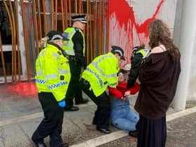 Protestors paint the Scottish Parliament (Image: This Is Rigged)