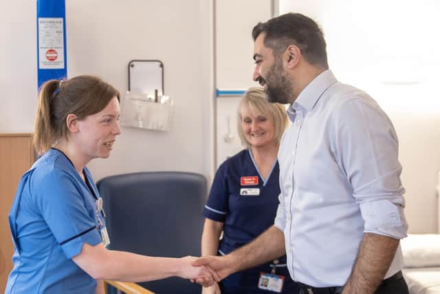 Humza Yousaf meets staff during a visit to visit the National Treatment Centre at Victoria Hospital in Kirkcaldy on Monday (Picture: Lesley Martin/PA)