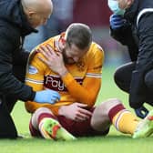Motherwell's Kevin van Veen clutches his shoulder during last weekend's 1-1 draw with Aberdeen at Fir Park.  (Photo by Alan Harvey / SNS Group)