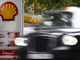 A London taxi drives past a petrol station. Picture: Dan Kitwood/Getty Images