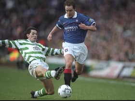 Rangers' Alex Clelland avoids the challenge of Celtic's Jackie McNamara during an Old Firm meeting in January 1998, a few months before the proposal to stage a friendly in Belfast to mark the Good Friday Agreement. Pic: Stu Forster /Allsport