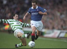 Rangers' Alex Clelland avoids the challenge of Celtic's Jackie McNamara during an Old Firm meeting in January 1998, a few months before the proposal to stage a friendly in Belfast to mark the Good Friday Agreement. Pic: Stu Forster /Allsport