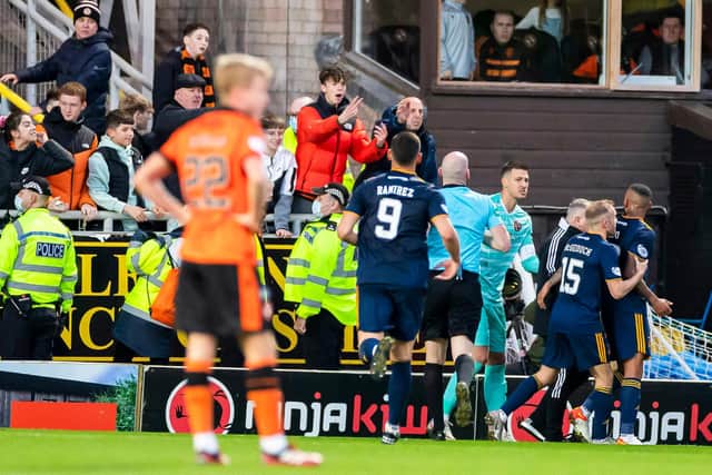 Aberdeen midfielder Funso Ojo was sent off after a confrontation with aDundee United fan. (Photo by Roddy Scott / SNS Group)