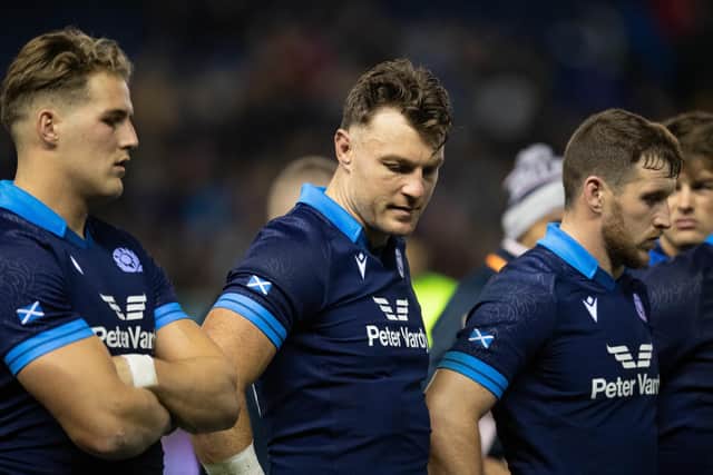 Disappointment at full time for Jack Dempsey and his new Scotland team-mates.  (Photo by Ross Parker / SNS Group)
