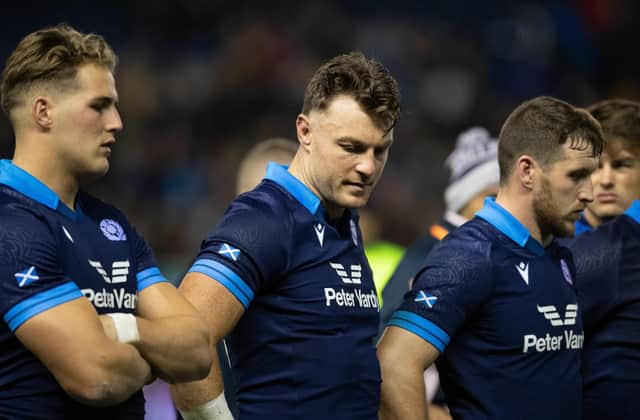 Disappointment at full time for Jack Dempsey and his new Scotland team-mates.  (Photo by Ross Parker / SNS Group)