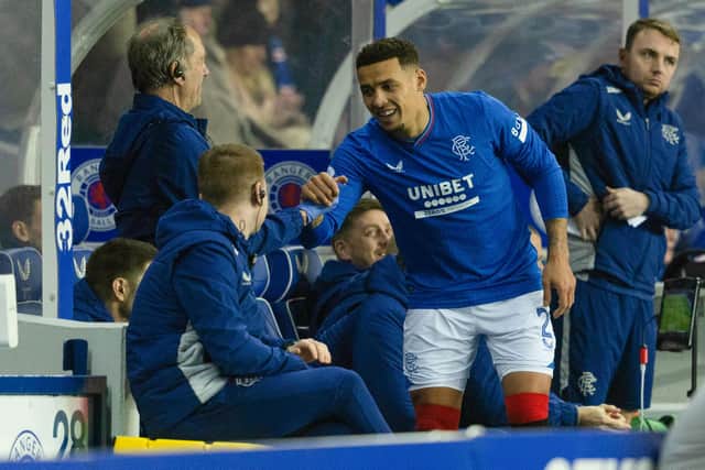 Rangers' James Tavernier high fives the bench during the win over St Johnstone.