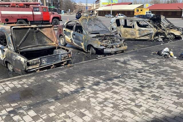 Burnt out vehicles are seen after a rocket attack on the railway station in the eastern city of Kramatorsk
