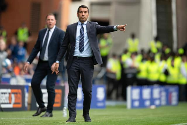 Rangers fans want Giovanni van Bronckhorst to use Champions League money to add to the squad. (Photo by Rob Casey / SNS Group)