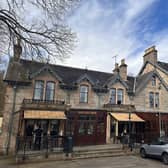 The 32-bedroom Victorian-style Cairngorm Hotel, which features a round tower, is situated across from Aviemore's railway station. Picture: Heartland Media/PR
