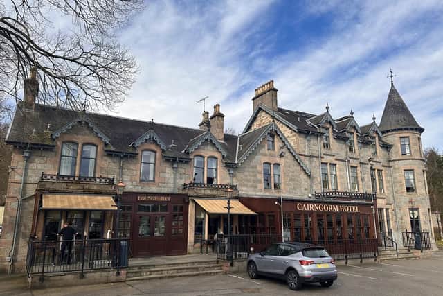 The 32-bedroom Victorian-style Cairngorm Hotel, which features a round tower, is situated across from Aviemore's railway station. Picture: Heartland Media/PR