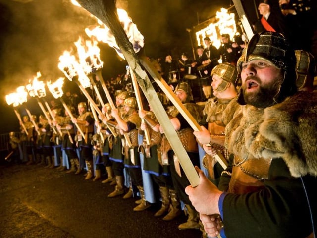 Looking like something from Norway, this is actually the Edinburgh Torchlight procession, which went along Princes Street and up Calton Hill. Part of the Hogmanay 2012 celebrations.