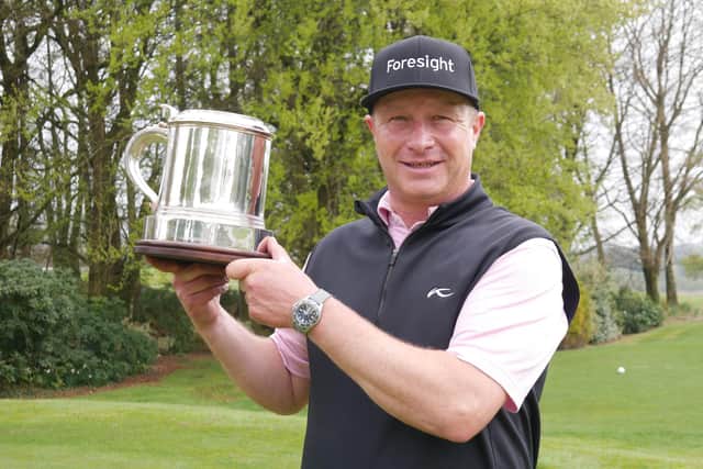 Torhins Golf Club professionals Greig Hutcheon shows off the trophy after winning The PGA Play-Offs in Ireland last Friday: Picture: The PGA