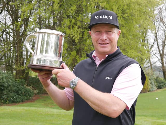 Torhins Golf Club professionals Greig Hutcheon shows off the trophy after winning The PGA Play-Offs in Ireland last Friday: Picture: The PGA