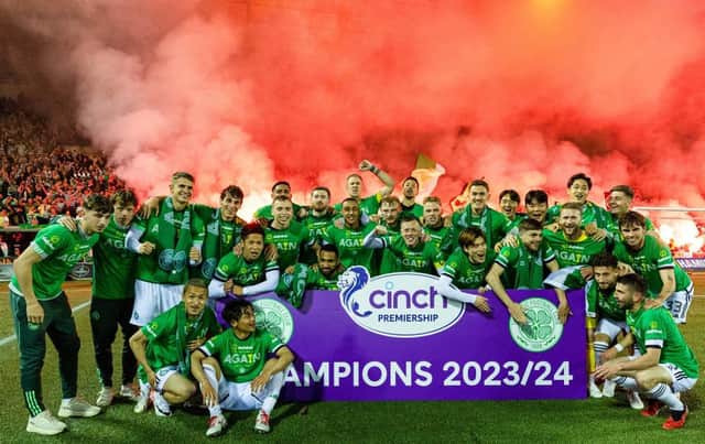 The Celtic squad celebrate in front of the visiting fans after clinching the title at Rugby Park. (Photo by Craig Williamson / SNS Group)