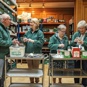 Volunteers working in a food bank