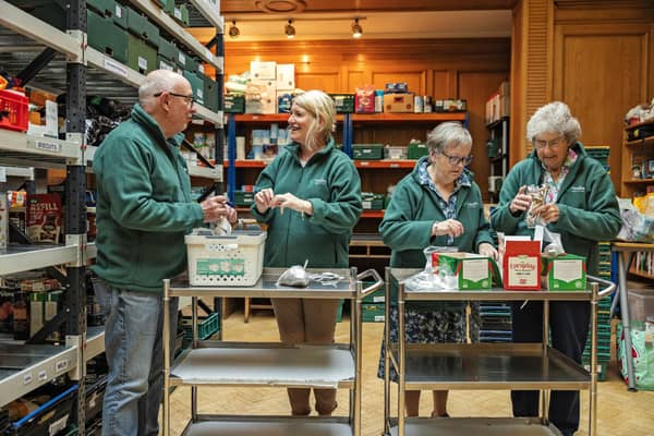 Volunteers working in a food bank