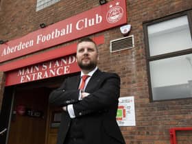 New Aberdeen chief executive Alan Burrows has held talks with caretaker boss Barry Robson.