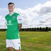 Hibs have signed Dylan Levitt on a three-year deal after completing his transfer from Dundee United.