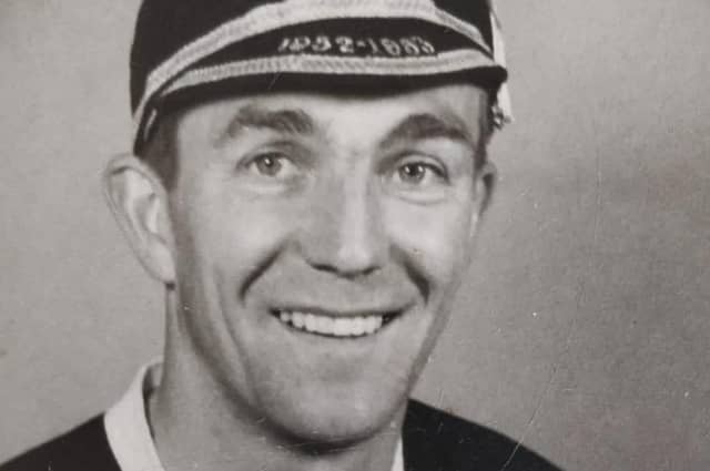 A smiling Doug Cowie, resplendent in Scotland cap