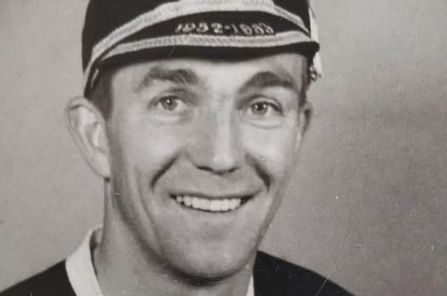 A smiling Doug Cowie, resplendent in Scotland cap