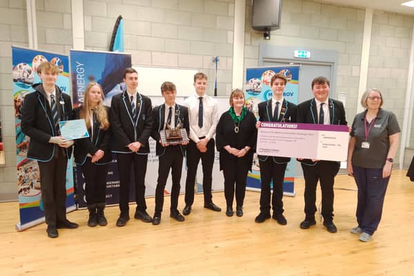 The Mintlaw ROV team are presented with their prize by Donella Beaton, RGU's Vice Principal for Business and Economic Development and Dr Ros Shanks, MATE Scotland Regional Coordinator.