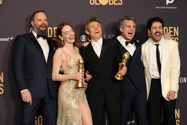 Yorgos Lanthimos, Emma Stone, Willem Dafoe, Mark Ruffalo, and Ramy Youssef, winners of the Best Picture, Musical or Comedy award for "Poor Things" pose in the press room during the 81st Annual Golden Globe Awards at The Beverly Hilton. Picture: Amy Sussman/Getty Images
