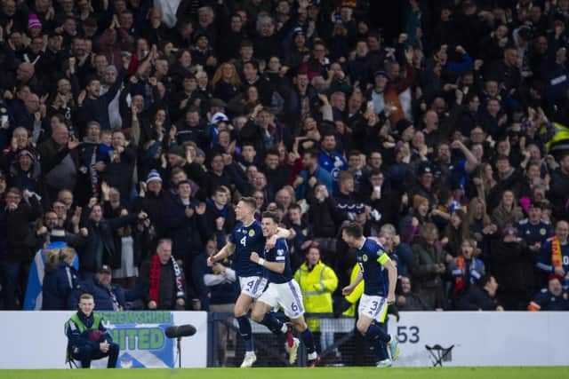 Scotland's Scott McTominay celebrates as he makes it 2-0 during the UEFA Euro 2024 qualifier between Scotland and Spain at Hampden Park. Photo by Ross MacDonald / SNS Group