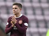 Hearts' Cammy Devlin applauds the fans after the 3-0 defeat by Celtic.