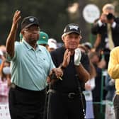 Honorary Starter Lee Elder  waves to the patrons as he is applauded by Gary Player and Jack Nicklaus during the ceremonial start to the 85th Masters at Augusta National Golf Club. Picture: Kevin C. Cox/Getty Images.