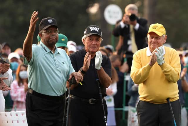 Honorary Starter Lee Elder waves to the patrons as he is applauded by Gary Player and Jack Nicklaus during the ceremonial start to the 85th Masters at Augusta National Golf Club. Picture: Kevin C. Cox/Getty Images.