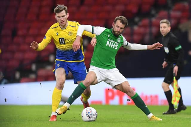 Jamie McCart and Hibs striker Christian Doidge battle for possession during St Johnstone's win at Hampden earlier in the season. Picture: SNS