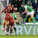 Will Fish heads home Hibs' second goal.