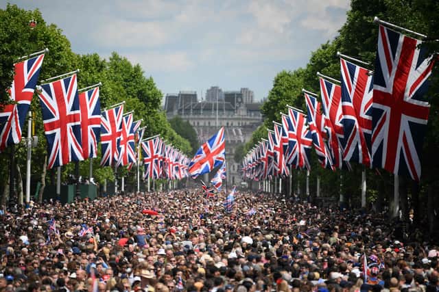 Members of the public fill The Mall before a flypast during the Queen's Birthday Parade, the Trooping the Colour, as part of Queen Elizabeth II's Platinum Jubilee celebrations. Photo by DANIEL LEAL/AFP via Getty