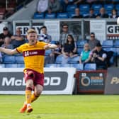 Motherwell's Blair Spittal scored twice as they took down Ross County 5-1.